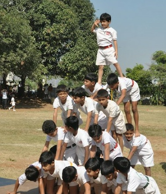 Boys in a human pyramid