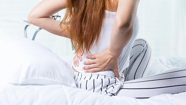 Nguyên nhân và triệu chứng của bệnh đau thắt lưng