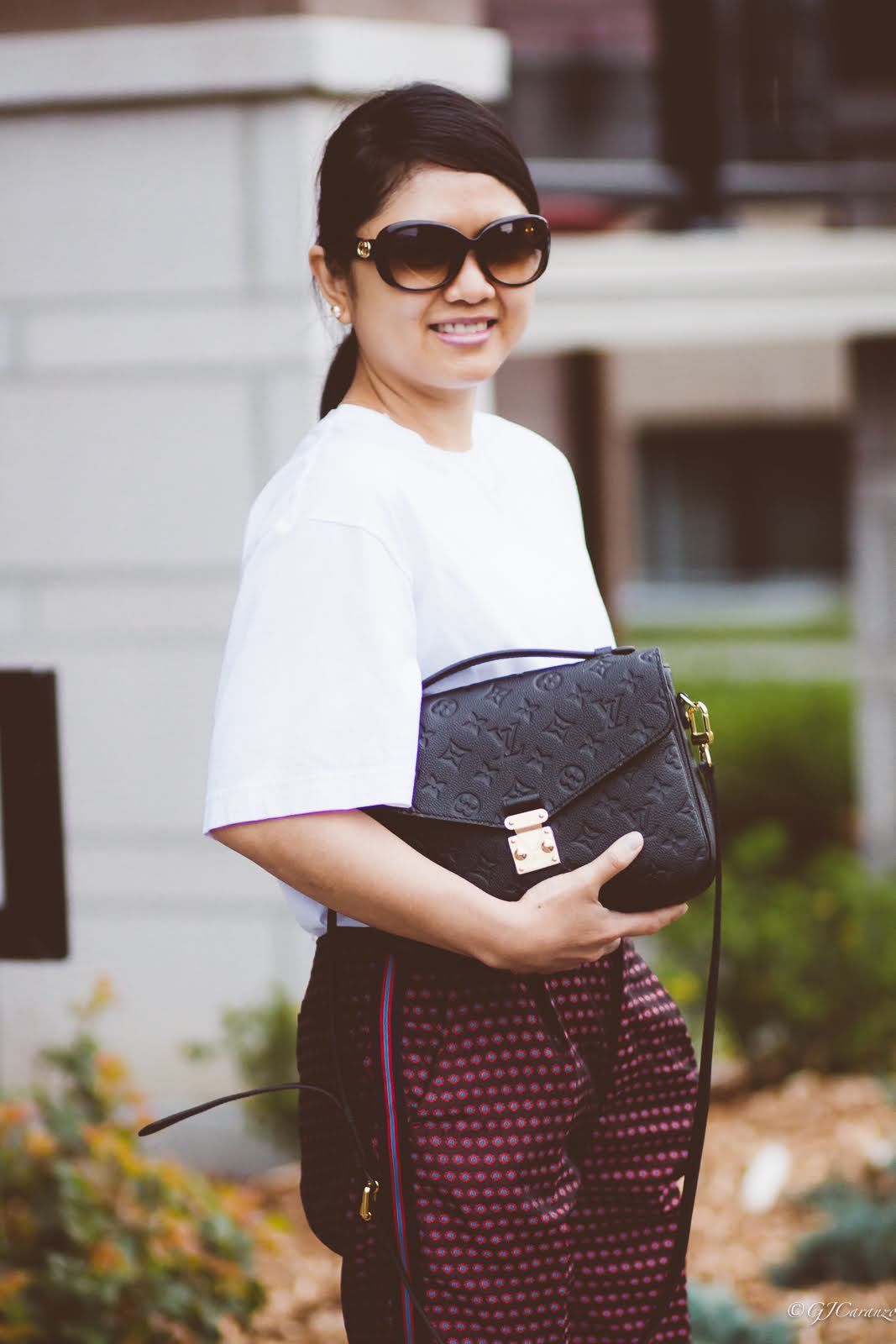 Zara pants with side stripes_uniqlo oversized white tee_coach bleeker sandals_gucci sunglasses_louis vuitton pochette metis in black empreinte leather