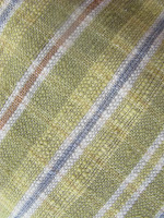 close-up of handwoven, naturally dyed table runner