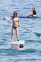 Olivia Wilde looks hot on a paddle board in a two piece bikini