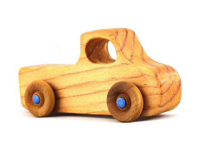 Handmade Wooden Toy Pickup Truck from the Play Pal Series Pine Amber Shellac With Metallic Blue Hubs