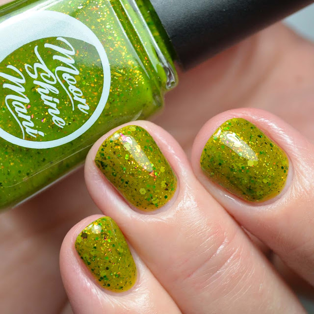 green glitter nail polish swatch