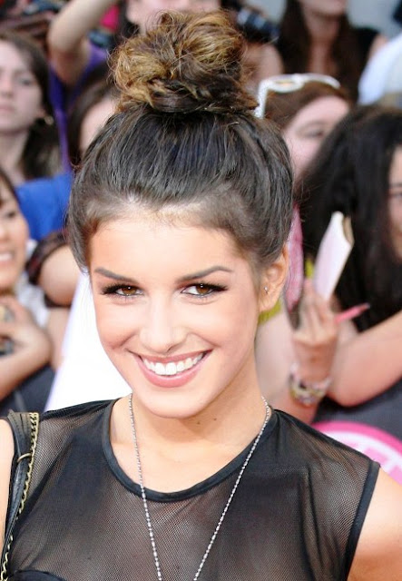 Shenae Grimes wore a part just off center, swept up her hair into a low,
