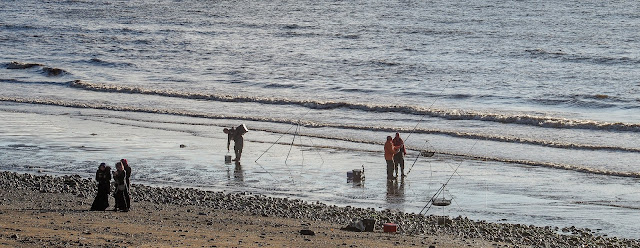 Photo of a fishing party on the beach at Maryport