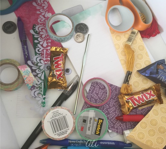 crafting items pens snacks in crafty junk drawer