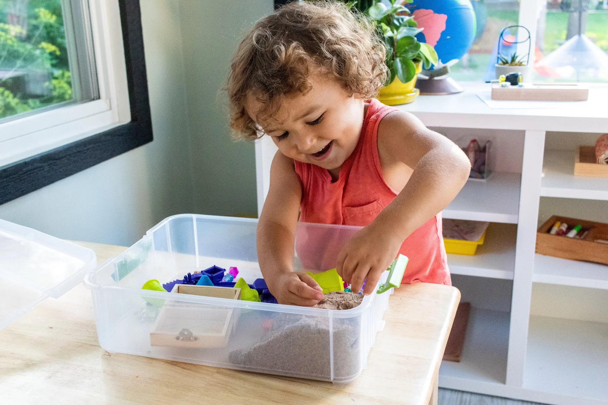 Montessori preschool activities for helping your child get more used to texture. This helps prepare their hand for sandpaper letters and other fun!