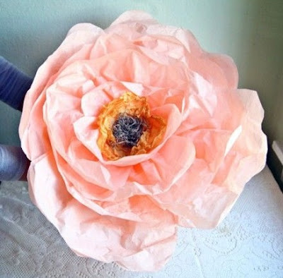 http://www.designsponge.com/2012/02/diy-project-giant-paper-flowers-from-ruche.html