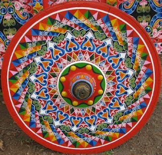 Colorful painted ox cart wheel