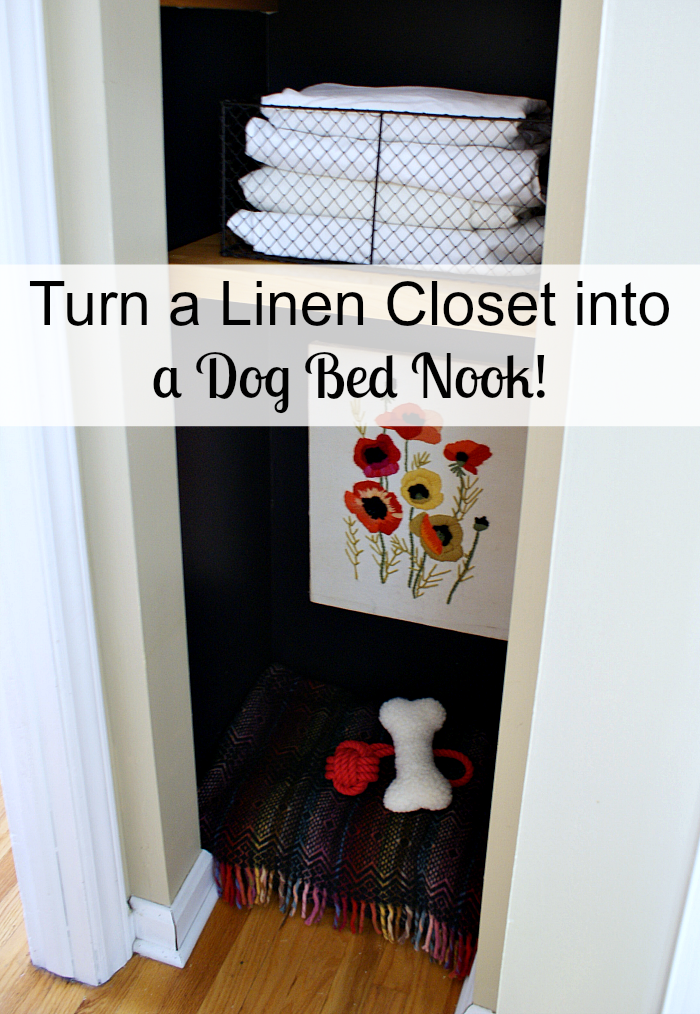 black painted linen closet with dog bed nook