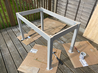 A painted wooden table frame