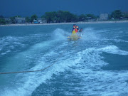 . sun visible in the sea water with waves at the beach Bandengan this . (pantai bandengan )