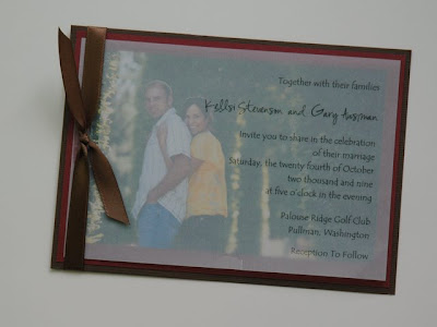 The invitation text is printed on vellum and overlays the couple 39s 