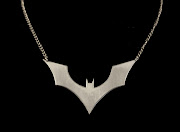 Available at https://www.etsy.com/listing/89643894/batmansymbolnecklace .