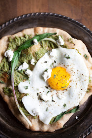 asparagus pesto pizza with ramps and a fried egg