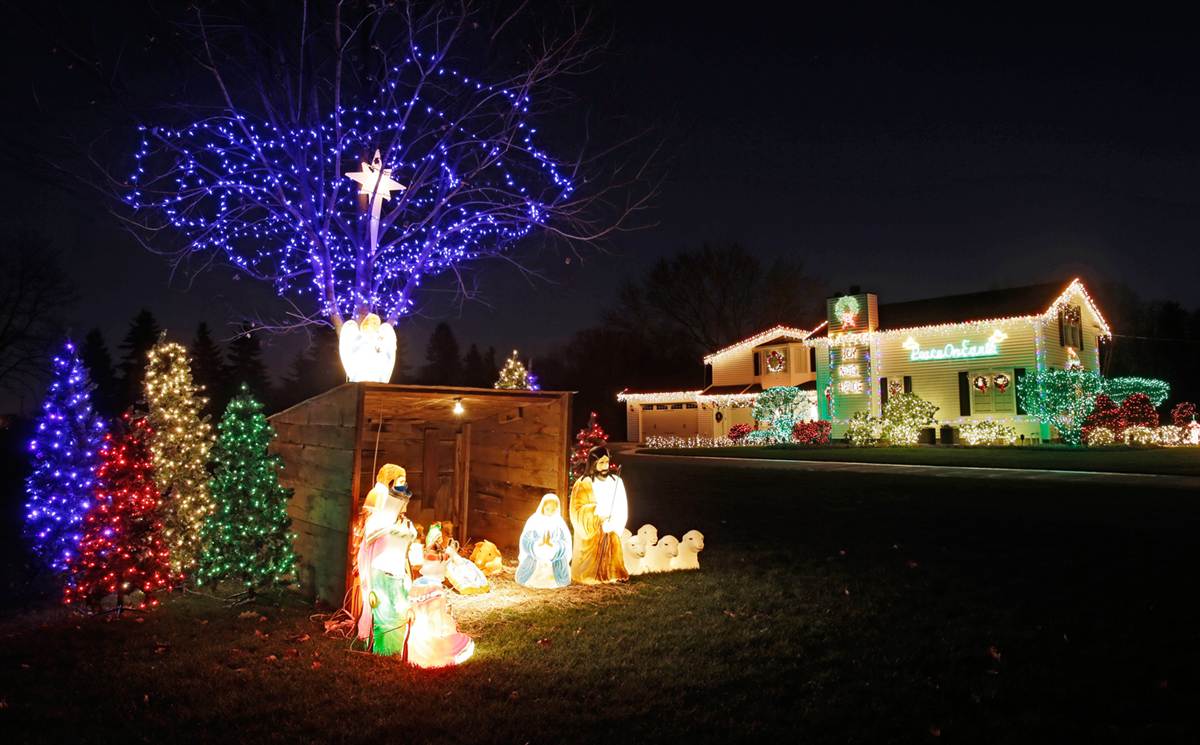 The holiday lighting display at the home of Norm and Michele Rados in ...