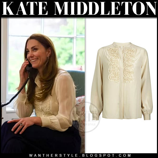 Kate Middleton in cream embroidered blouse and navy trousers