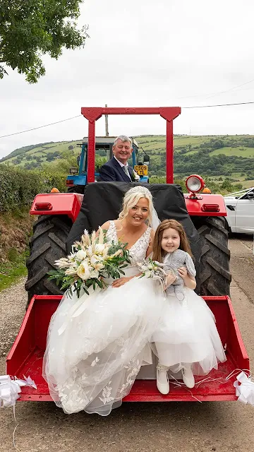 British bride arrived for her wedding in a tractor