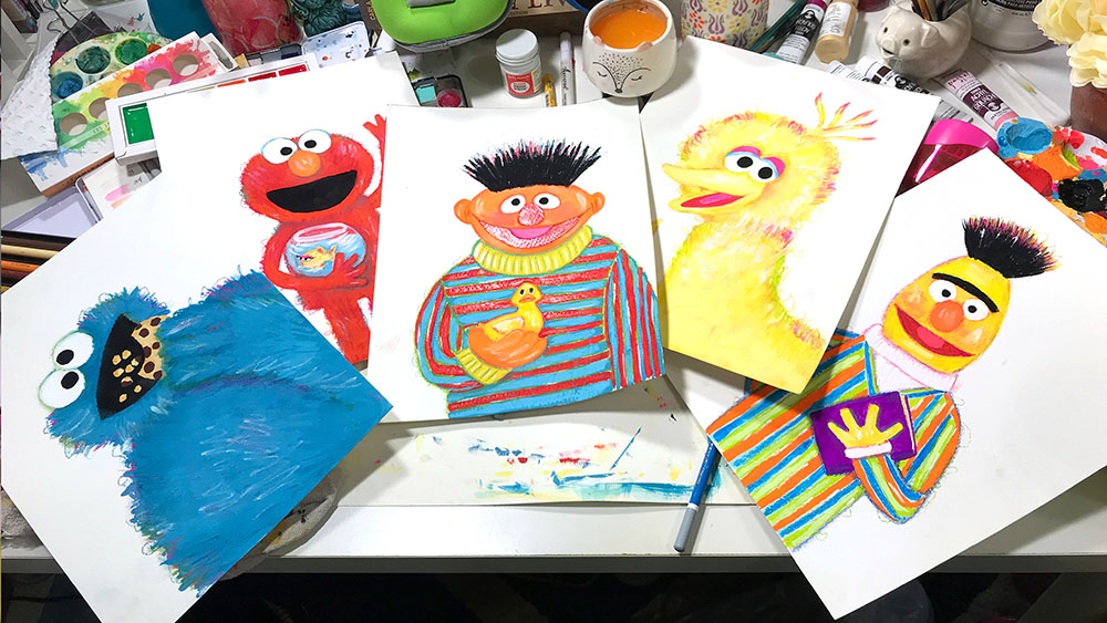 image of Sesame Street characters painted on an art desk