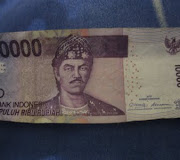 ODD THINGS, 10,000 Found In Currency