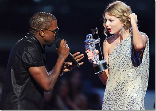 Kanye West takes the microphone from Taylor Swift and speaks onstage during the 2009 MTV Video Music Awards at Radio City Music Hall on September 13, 2009 in New York City.
2009 MTV Video Music Awards - Show
Radio City Music Hall
New York, NY United States
September 13, 2009
Photo by Kevin Mazur/WireImage.com

To license this image (16951148), contact WireImage.com