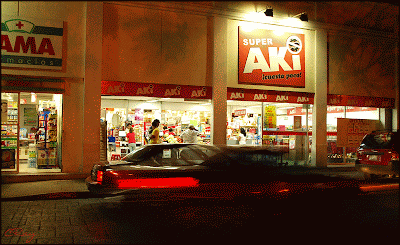 Motion shot of cars in downtown Merida Mexico at Night