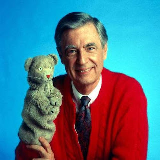 Mr Rogers and a hand puppet