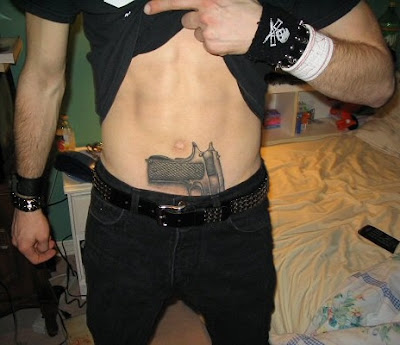 Awesome tat, d-bag. His fat stomach and acid wash jeans weren't attracting 