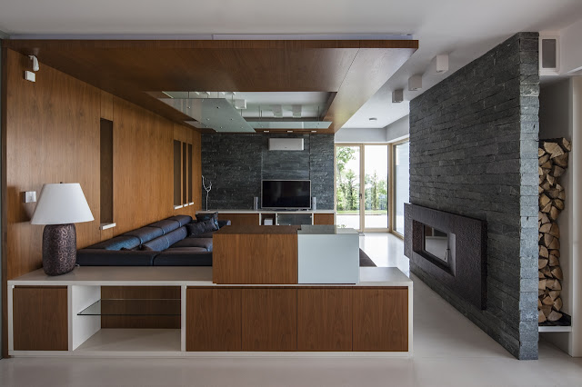 Modern living room in the Lake Side Duplex House