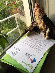 Póilin Puppet reading the Arts & Disability Ireland Connect  letter