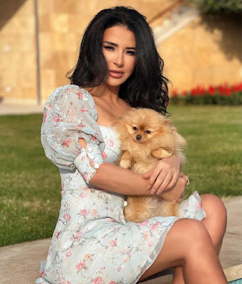 Maguy Bou Ghosn with her Dog
