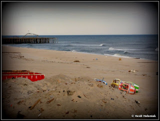 The sandy beach near Funtown Pier, Seaside Heights, NJ January 2013 after Hurricane Sandy. Rollercoaster in distance