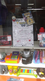 Pokemon Go Lure Party's Poster in Shared Space's Shop Window