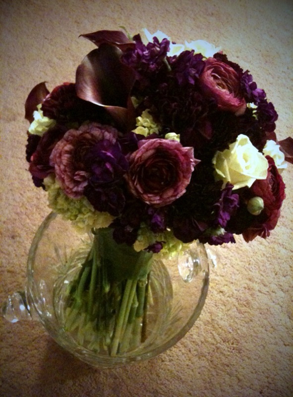 Here's Tyler's beautiful bridal bouquet purple ranunculus deep purple