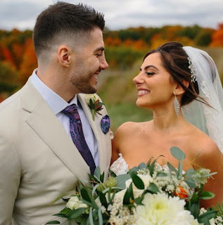 Emumita Bonita with her husband Nickmercs in their wedding dress