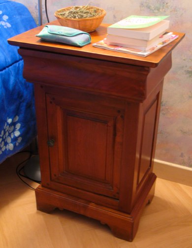 The small bedside table bought through an INTERNET second hand site.