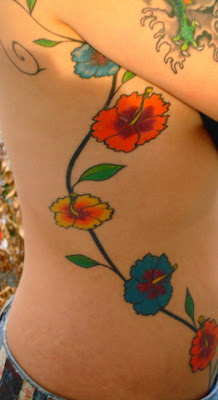female tattoos,sexy girl tattoo,tattoo art designs,flower tattoo,body tattoo,nice tattoo,permanent tattoo