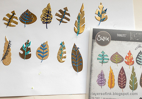 Layers of ink - Blue and Gold Card Tutorial by Anna-Karin Evaldsson. Die cut Tim Holtz leaves