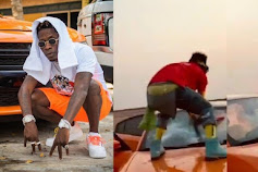 Shatta Wale gets angry & destroys the windscreen of his expensive Dodge Charger car (Video)