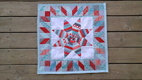 red and aqua round robin quilt