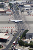 Highway Passing Through the Airport Runaway.txt