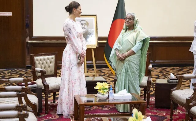 Crown Princess Victoria wore a Meadow romantic orchid silk dress from By Malina. Prime Minister Sheikh Hasina