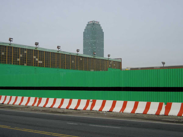 Gone Green - Fence & barrier next to Hunters Point Steel on 49th Ave. in Queens.