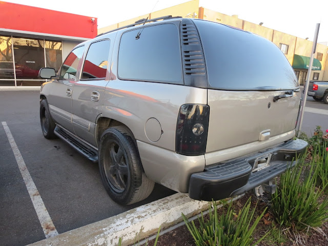 Key scratches gone from Chevrolet Tahoe after complete repaint at Almost Everything Auto Body