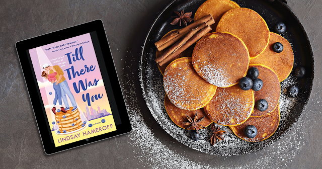 "Til There Was You" book on iPad sitting next to plate of blueberry pancakes