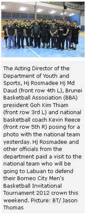 The Acting Director of the Department of Youth and Sports, Hj Rosmadee Hj Md Daud (front row 4th L), Brunei Basketball Association (BBA) president Goh Kim Thiam (front row 3rd L) and national basketball coach Kevin Reece (front row 5th R) posing for a photo with the national team yesterday. Hj Rosmadee and other officials from the department paid a visit to the national team who will be going to Labuan to defend their Borneo City Men's Basketball Invitational Tournament 2012 crown this weekend. Picture: BT/ Jason Thomas 
