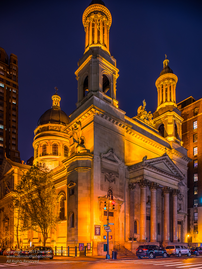 a photo of a catholic church in new york taken at night