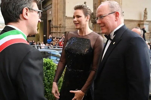 Princess Charlene wore crew-neck jacket and trousers by Emporio Armani, and tulle and sequin long sleeve a-line gown by Akris