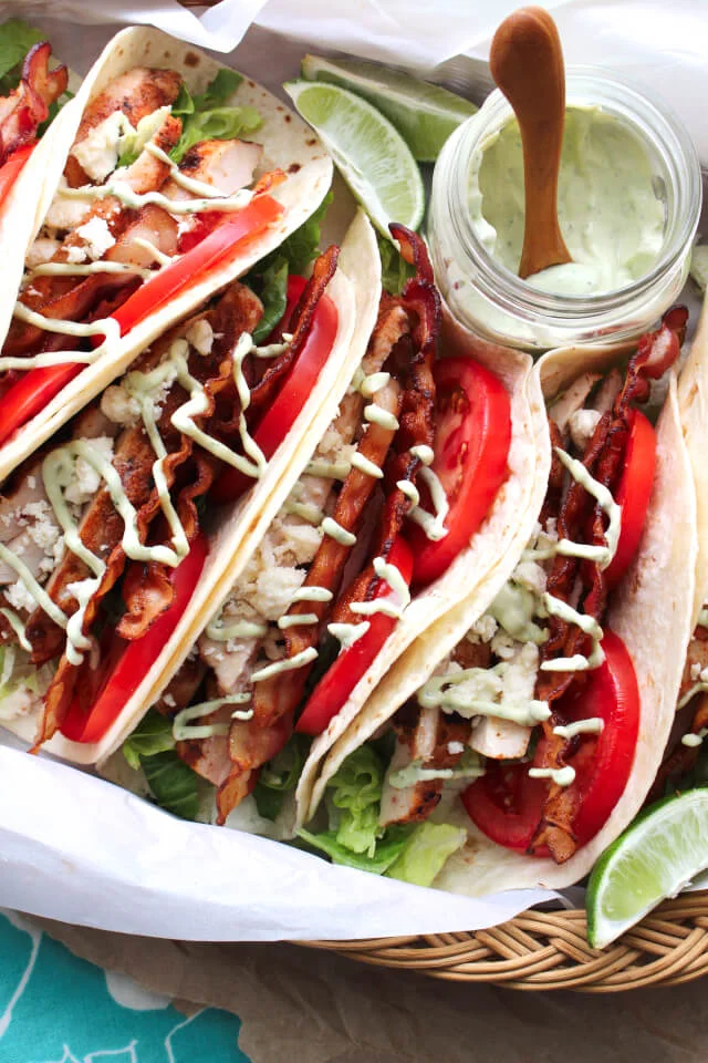 BLT Grilled Chicken Tacos are a fresh and summery twist on tacos made with classic BLT ingredients, dry-rubbed grilled chicken, and a cool avocado ranch drizzle. #MissionOrganics #ad @missionfoods