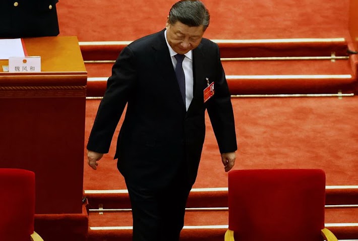 Chinese President Xi Jinping arrives in Beijing for the National People's Congress (NPC) concluding session at the Great Hall of the People.